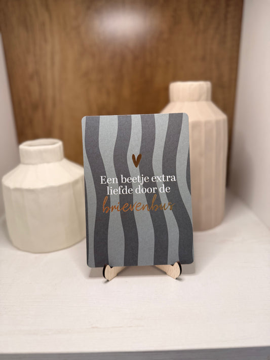 Kaartje "een beetje extra liefde door de brievenbus"